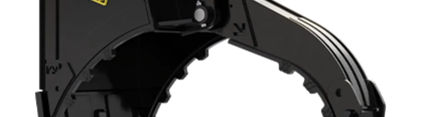 A multi-grab bucket attachment on heavy machinery, designed for handling and moving bulky construction materials efficiently.