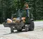 Orange and gray Case Backhoe Loader with 15 foot Dig Depth