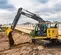 Yellow and black John Deere excavator