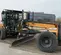 Orange and gray CASE 195-205 HP Motor Grader, 14 ft. lame