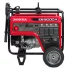 Génératrice portative de 5 000 à 5 400 W HONDA rouge et noire, essence